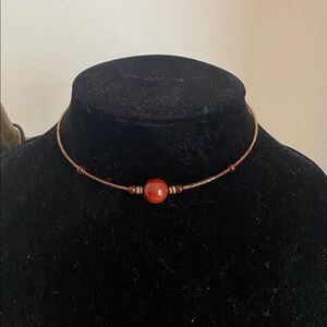 A Trio of Handmade Chokers-adorned with natural gems.